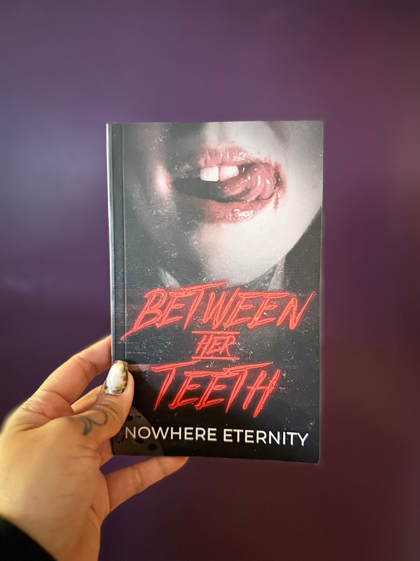 Between Her Teeth By: Nowhere Eternity