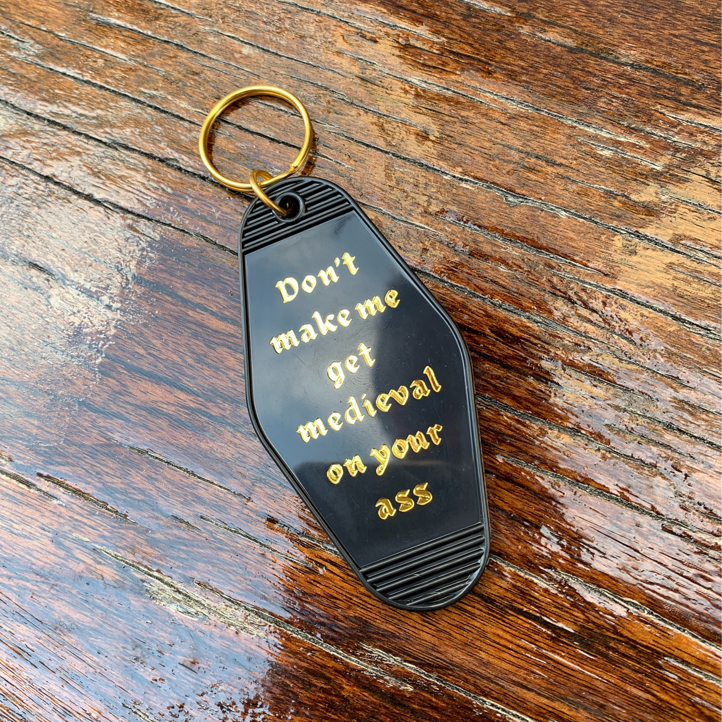 Don't Make Me Get Medieval on Your Ass Motel Keychain Black