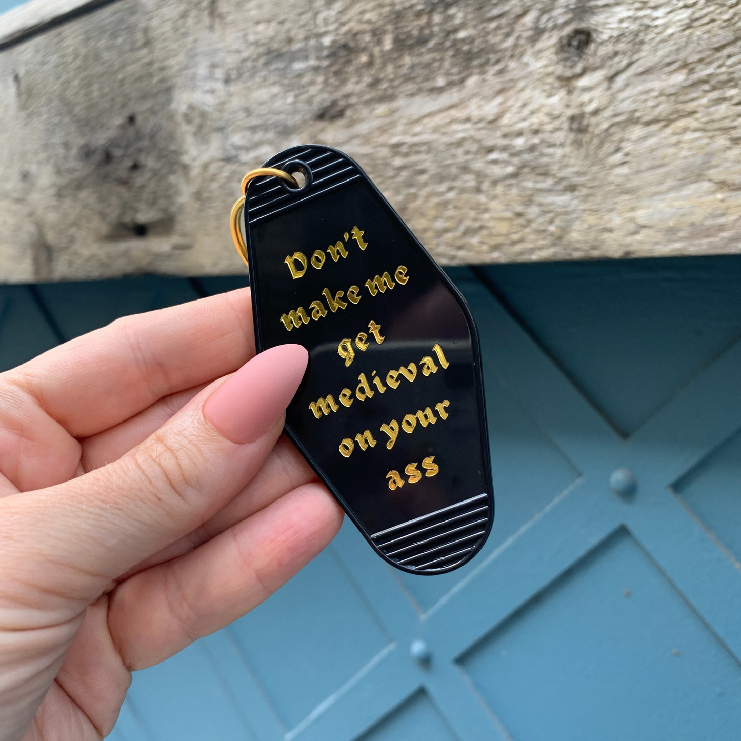 Don't Make Me Get Medieval on Your Ass Motel Keychain Black